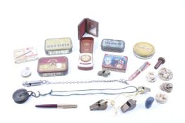 Assortment of small collectable items.