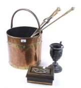 A group of vintage brass and copper items.