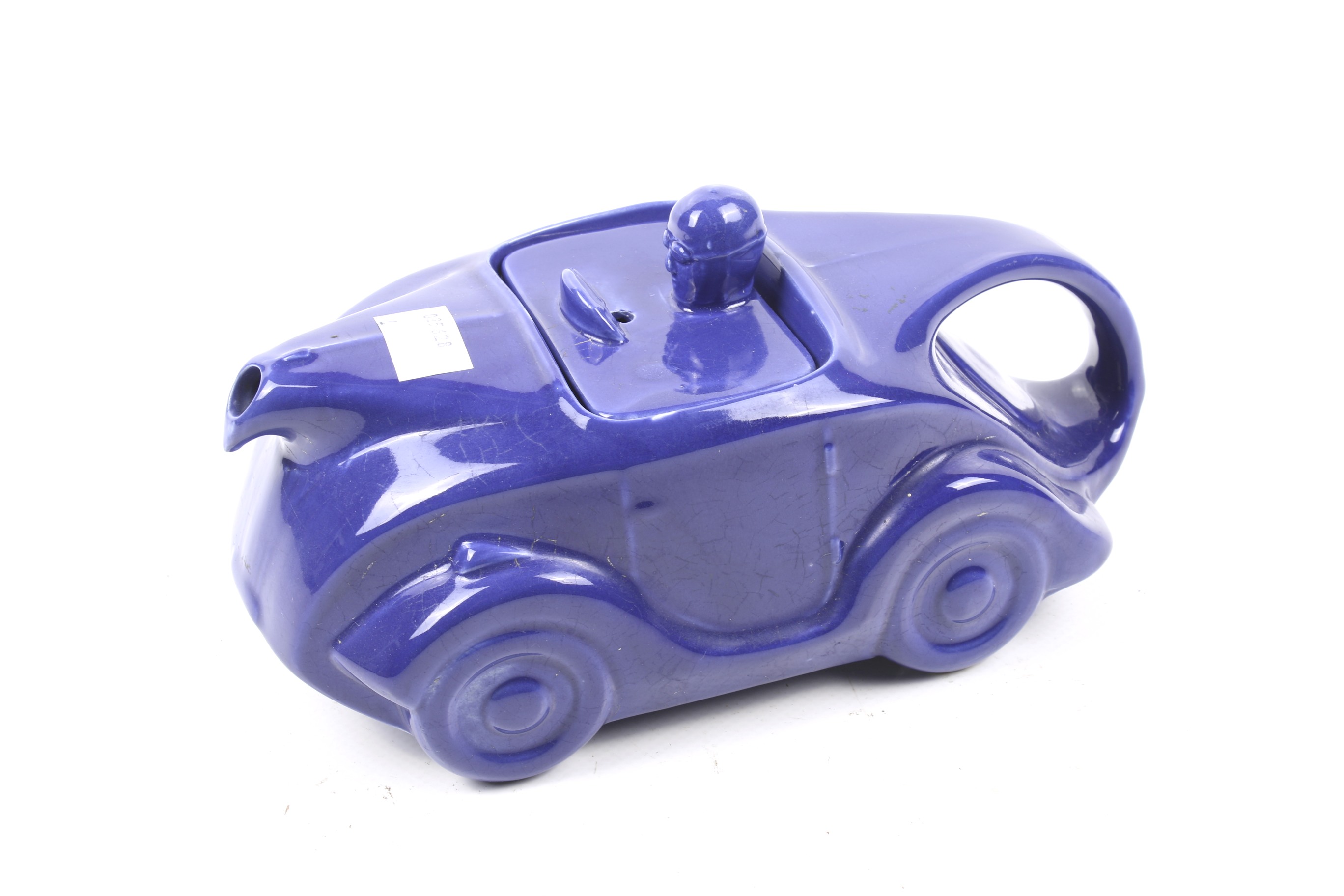 An Art Deco Sadler racing car teapot.