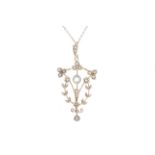 An Edwardian gold, aquamarine and seed pearl open flower and leaf pendant. Stamped '15ct', approx.