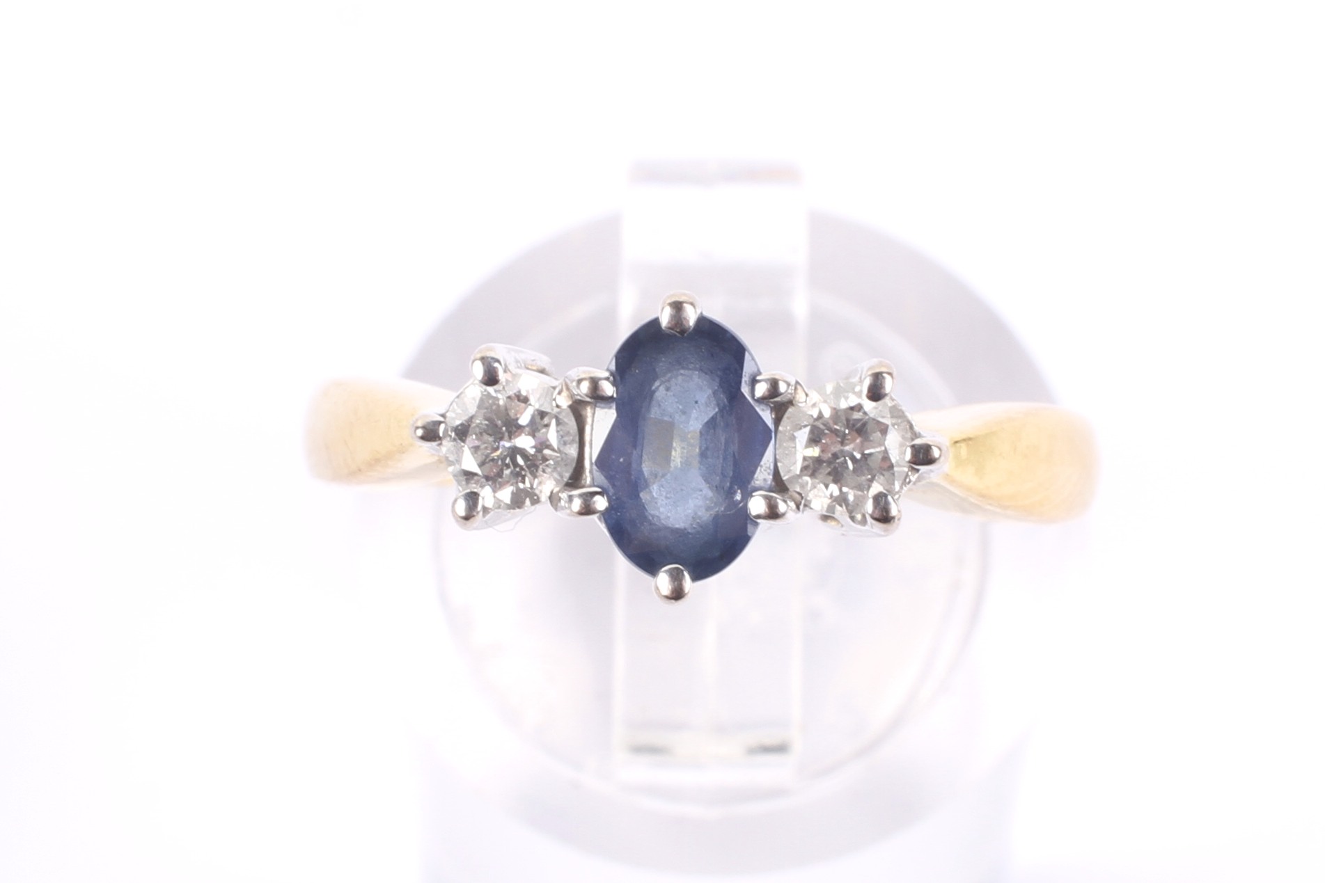 A modern 18ct gold, sapphire and diamond three stone ring. - Image 2 of 4