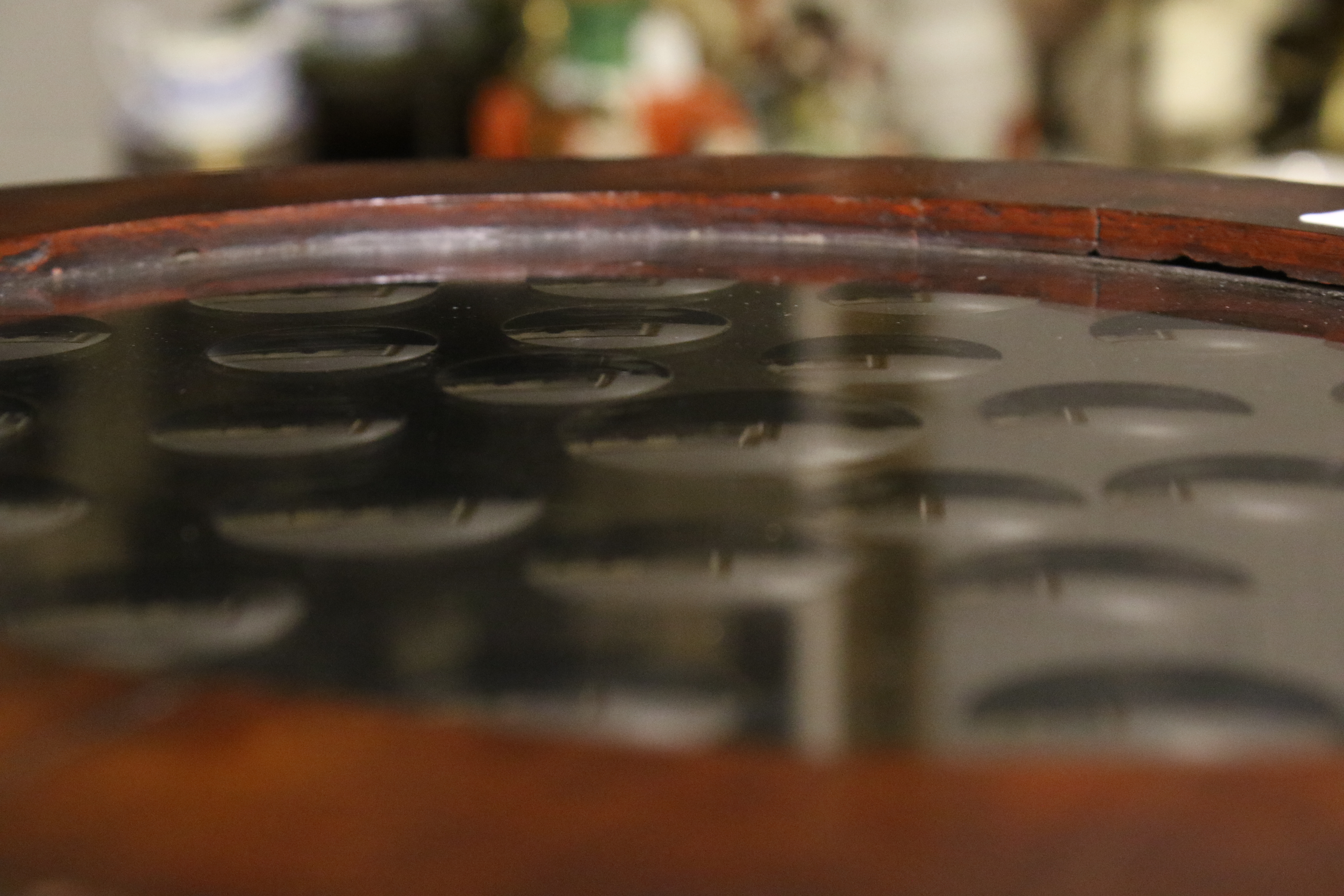 A rare 19th century sorcerer's mirror. Of oval form, in a dark mahogany veneered frame, 28cm x 34cm. - Image 4 of 4