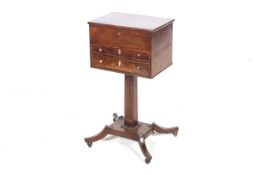 A 19th century mahogany work table.