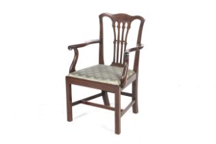 A Georgian mahogany chippendale style armchair.