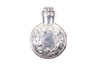An Edwardian silver scent bottle case by William Comyns, and fitted clear glass scent bottle.