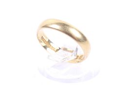 A Victorian 18ct gold wedding band. Hallmarks for Birmingham 1876, size J+, approx. 3.
