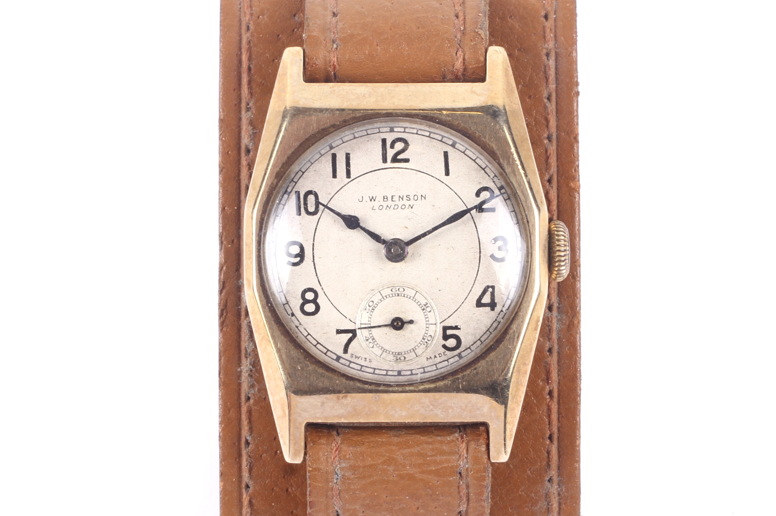 J W Benson, London, a Swiss mid-size 9ct gold tonneau shaped wrist watch, circa 1936.