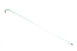 A glass end of day walking stick.Brass end to handle with a brass cap to the bottom.