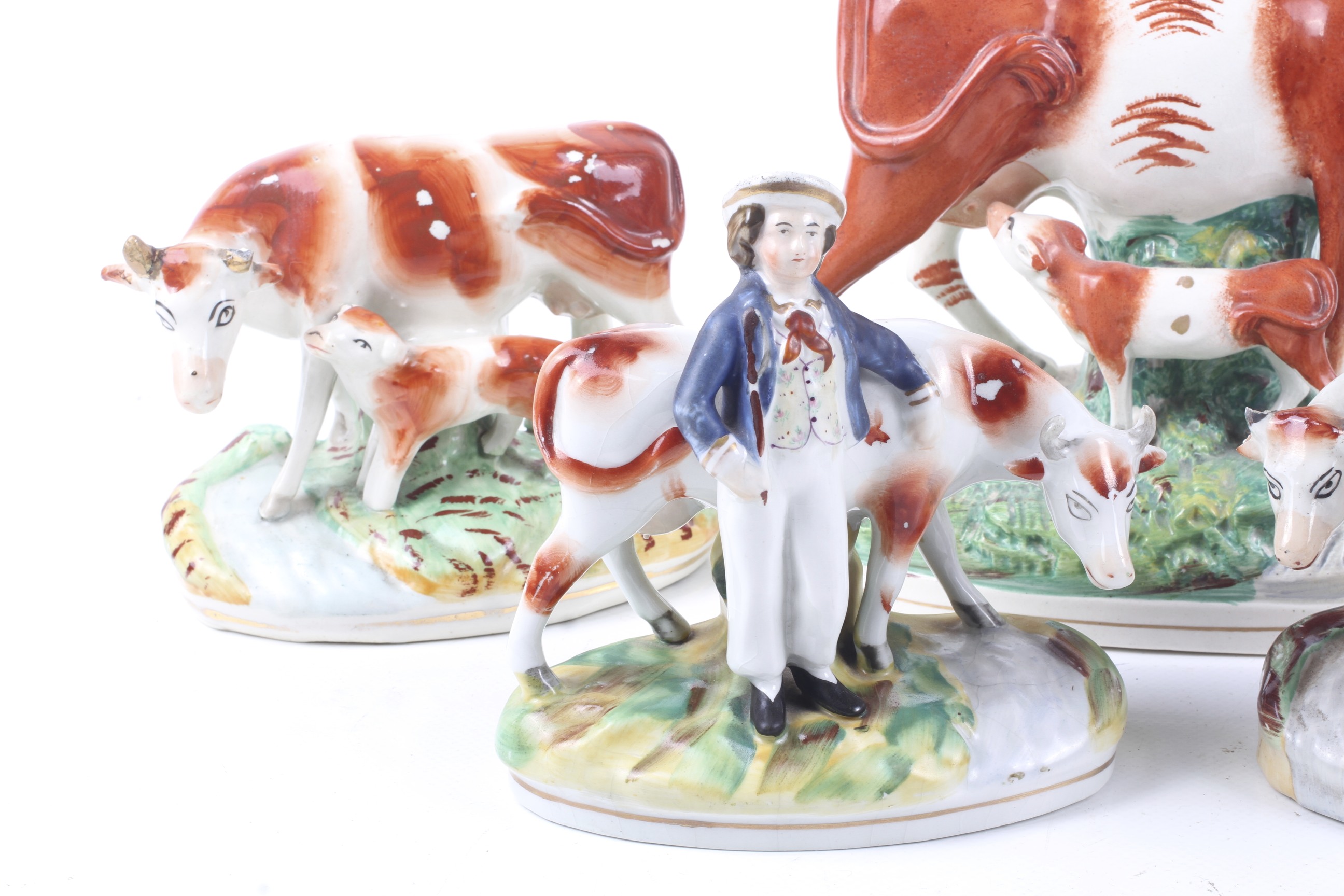 Five 19th century Staffordshire cow figures. - Image 2 of 3