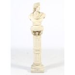 Garden / Salvage : a composite stone bust on stand of the god Apollo on a Corinthian column ,