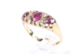 An Edwardian gold, ruby and diamond dress ring.