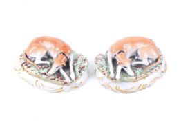 A pair of Victorian Staffordshire models of greyhounds.