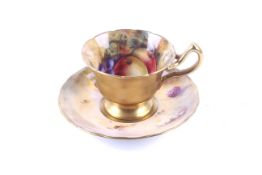 A Royal Worcester teacup and saucer.
