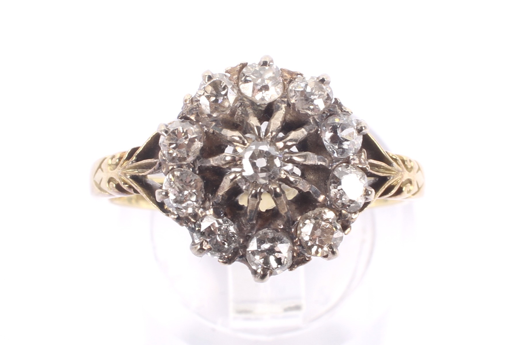 An early 20th century gold and diamond cluster ring. The 11 old-cut stones approx. 1. - Image 2 of 4