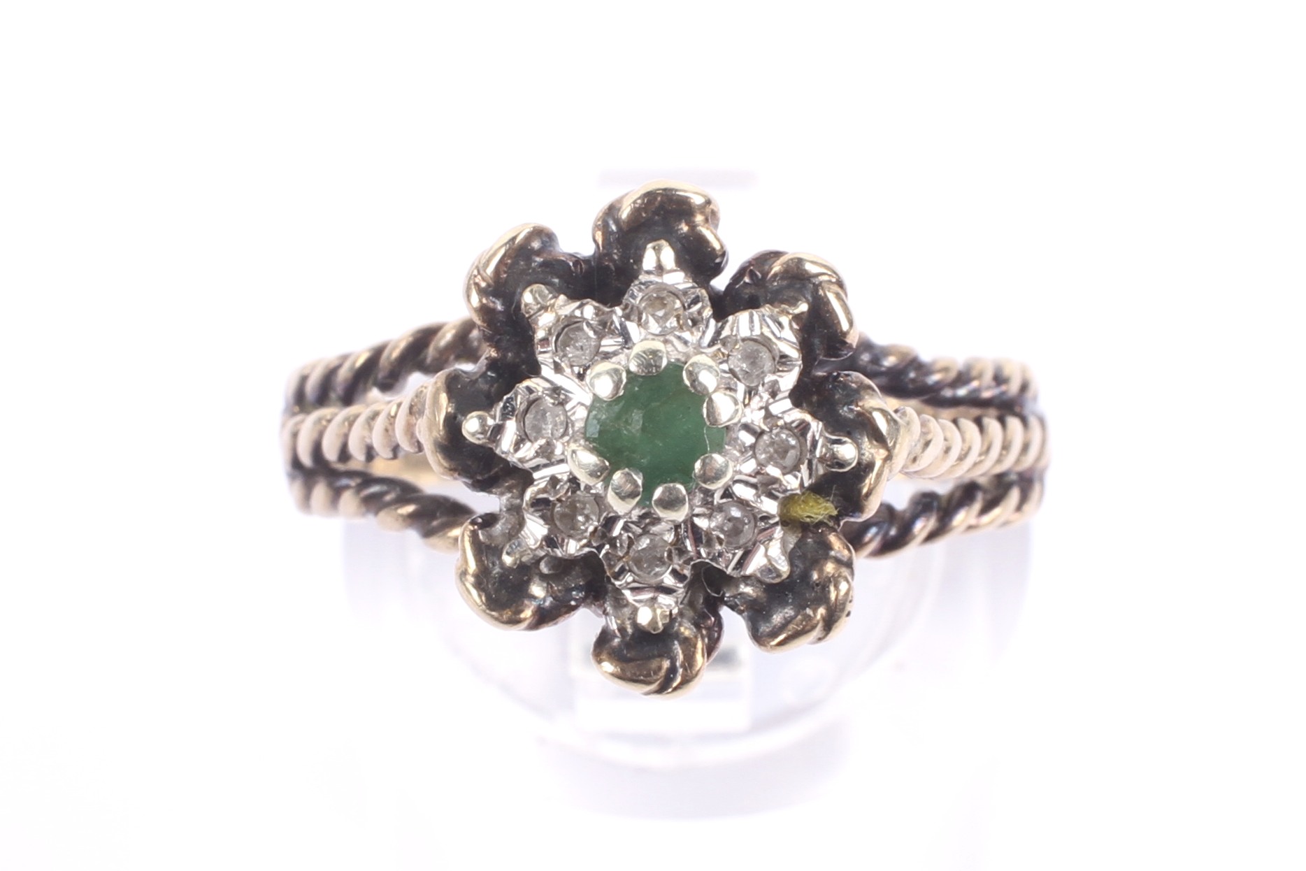 A vintage 9ct gold, emerald and diamond cluster ring. - Image 2 of 4