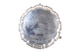 A silver shaped-round waiter.