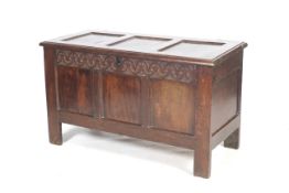 An antique oak coffer.