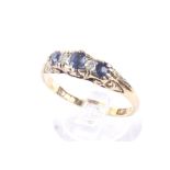 An early 20th century gold, sapphire and diamond five stone ring.