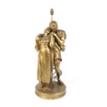 A mid-late 20th century gilt painted plaster electric lamp in the classical manner of figures.