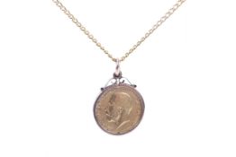 A sovereign, 1914, later mounted in a gold pendant.