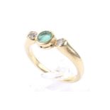 A vintage 18ct gold, emerald and diamond three stone ring,