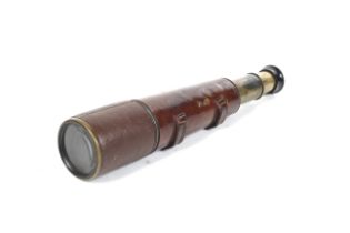 A circa 1910 brass three drawn telescope.