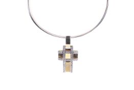 A modern cross pendant and necklace.