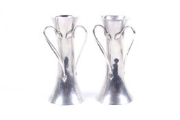 A pair of Art Nouveau silver vases.