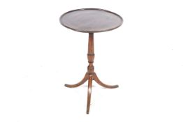 A 19th century mahogany tilt-top occasional table.