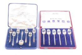 Two sets of six Royal Accession 'British Hallmarks' commemorative coffee spoons, in cases.