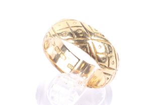 A late Victorian 18ct gold broad wedding band.