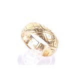 A late Victorian 18ct gold broad wedding band.