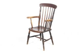 A 19th century stick back Windsor chair.