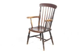 A 19th century stick back Windsor chair.