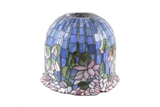 A large Tiffany style flowering lotus lampshade in blue and pink.