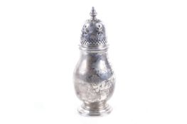 A silver baluster-shaped sugar caster.