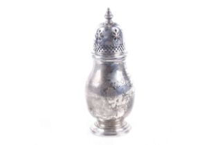 A silver baluster-shaped sugar caster.