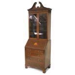 A Sheraton Revival Edwardian mahogany bureau bookcase.