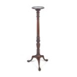 A 19th century mahogany plant stand or torchere.