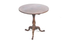 A 19th century mahogany tripod table.