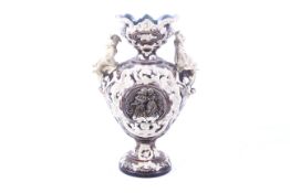 A Victorian Majolica vase.