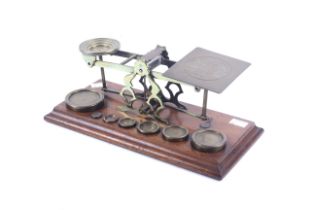A set of early 20th century S Morden & Co postage scales.