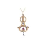 An early 20th century gold, rose diamond and synthetic ruby openwork pendant.