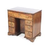 An 18th century mahogany Kneehole desk.