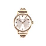 Accurist, a lady's 9ct gold cased round bracelet watch, circa 1968.