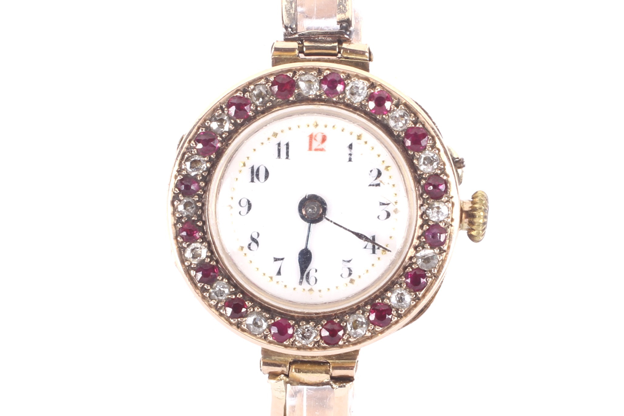 A lady's 9ct gold, ruby and diamond set bracelet watch, circa 1911.