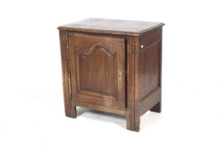 A 19th century Continential oak single door cupboard. L75cm x D48cm x H80cm.