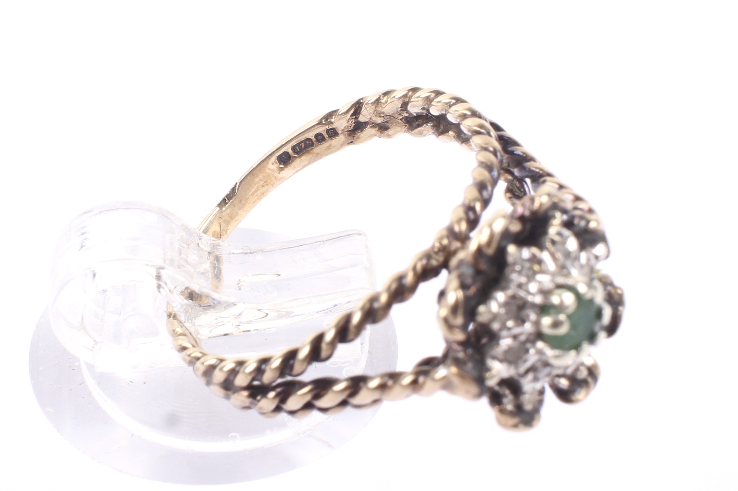 A vintage 9ct gold, emerald and diamond cluster ring. - Image 4 of 4