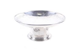 A silver round tazza or fruit stand.