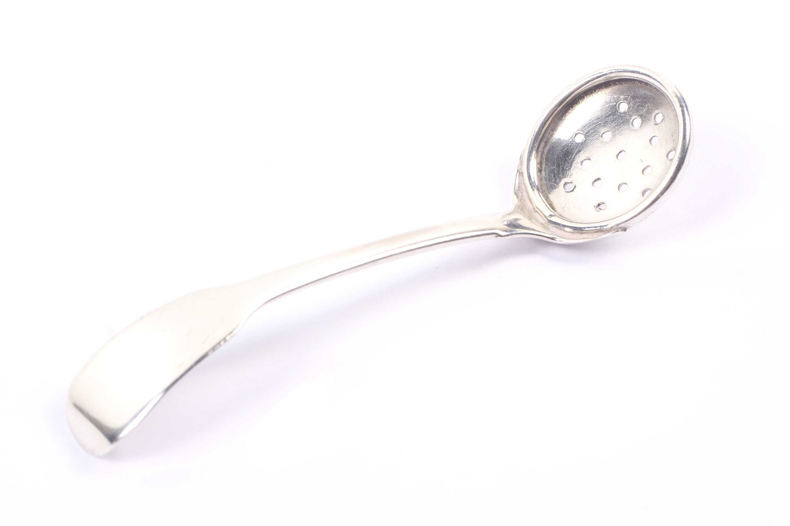 A George IV Irish silver fiddle pattern skimmer or mote type spoon.